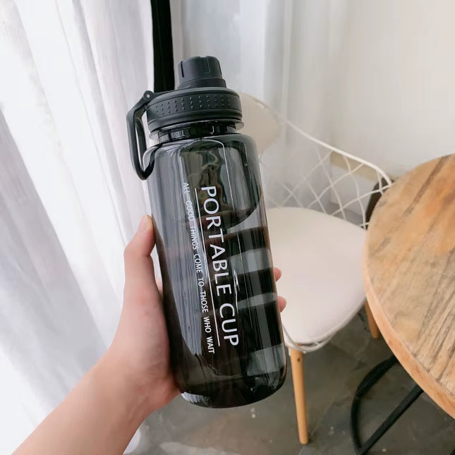 1000Ml Large Capacity Sports Water Bottle Leakproof Plastic Water Jugs with Handheld Ring Outdoor Cyclinghiking Beach Gym Kettle